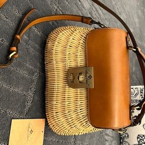 Wicker and leather handbag 11 inches across bottom 9 inches top to bottom